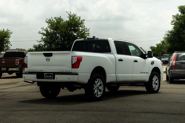 Photo of 2024 Glacier White Nissan Titan XD
