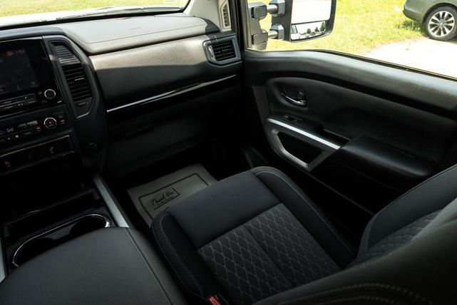 Photo of 2024 Glacier White Nissan Titan XD