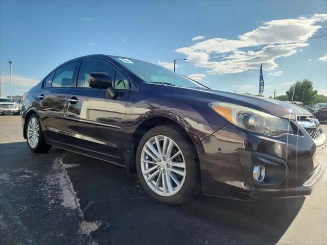 Photo of 2013 Burgundy Subaru Impreza