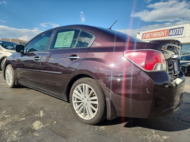 Photo of 2013 Burgundy Subaru Impreza