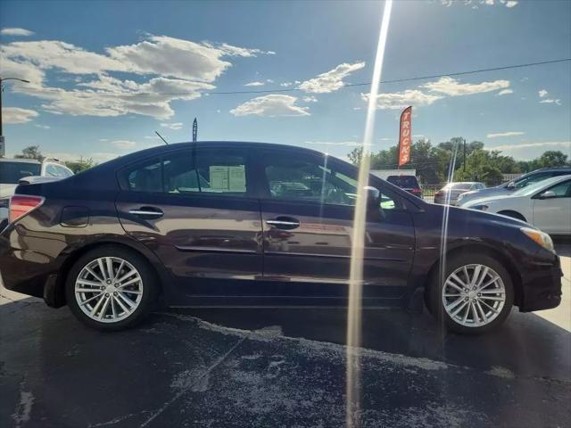Photo of 2013 Burgundy Subaru Impreza