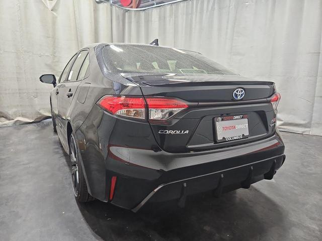 Photo of 2025 Midnight Black Metallic Toyota Corolla Hybrid