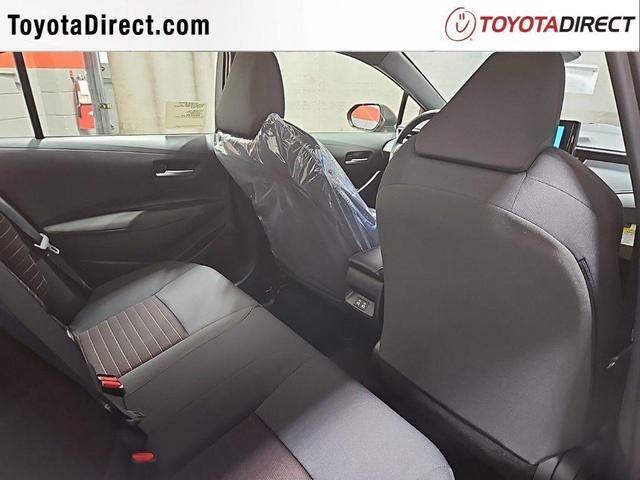 Photo of 2025 Midnight Black Metallic Toyota Corolla Hybrid