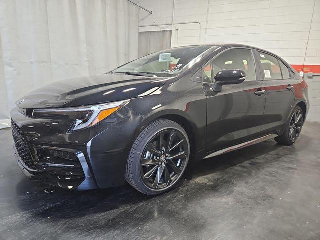 Photo of 2025 Midnight Black Metallic Toyota Corolla Hybrid