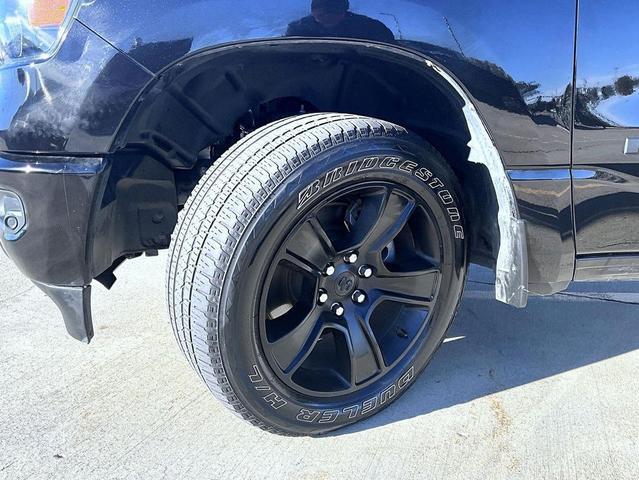 Photo of 2024 Diamond Black Crystal Pearlcoat RAM 1500