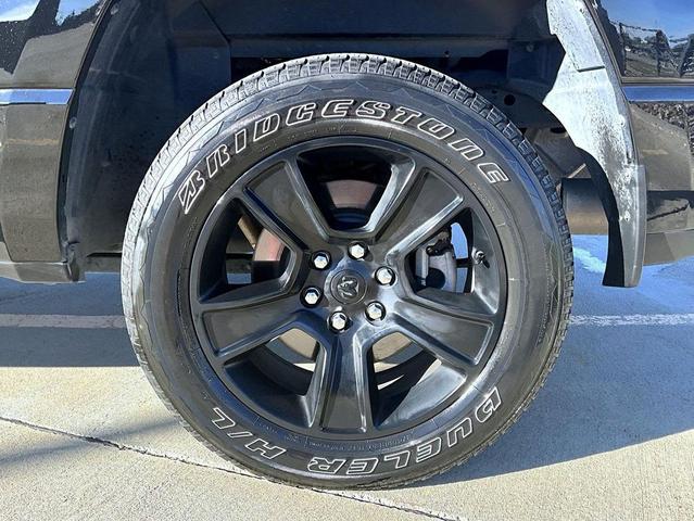 Photo of 2024 Diamond Black Crystal Pearlcoat RAM 1500