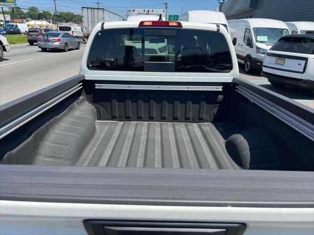 Photo of 2025 Glacier White Nissan Frontier