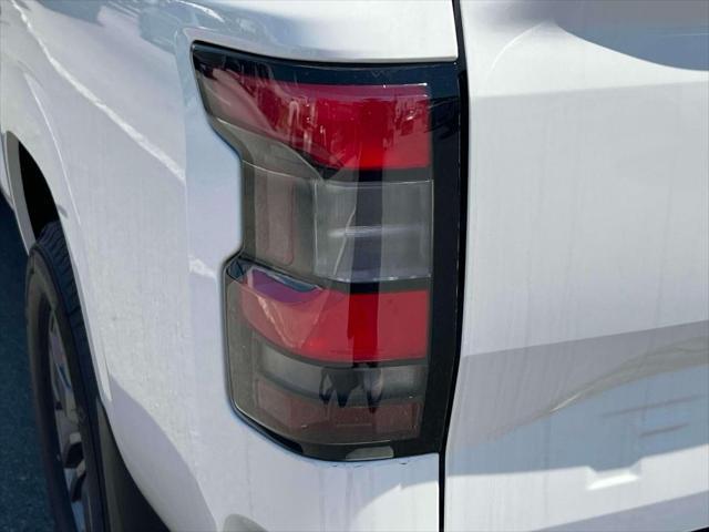 Photo of 2025 Glacier White Nissan Frontier