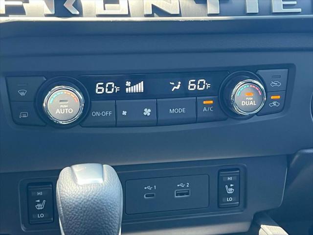 Photo of 2025 Glacier White Nissan Frontier