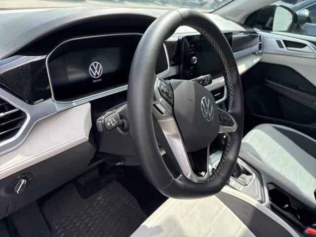 Photo of 2025 Deep Black Volkswagen Taos