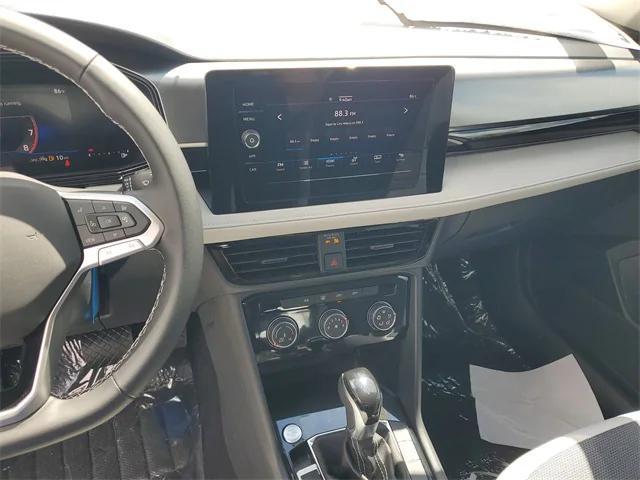 Photo of 2025 Pure White Volkswagen Taos