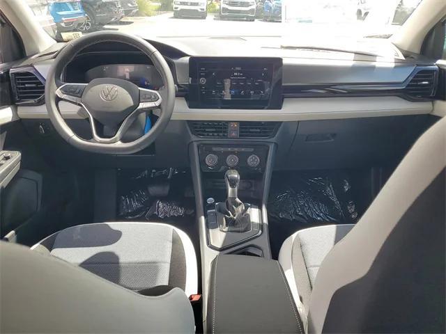 Photo of 2025 Pure White Volkswagen Taos