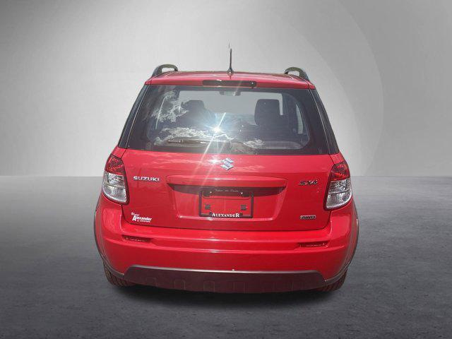 Photo of 2010 Vivid Red Suzuki SX4