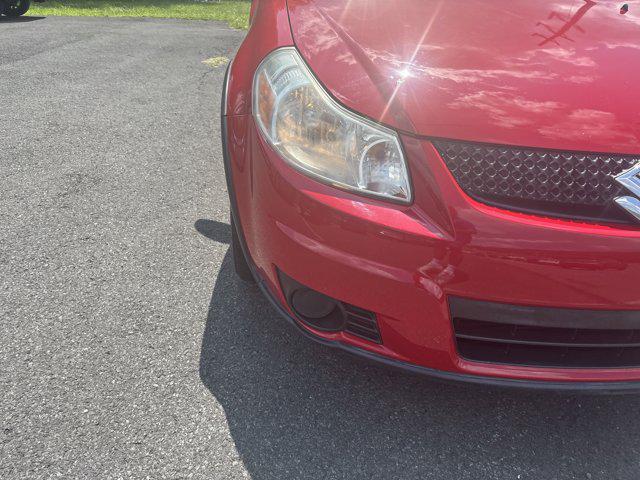 Photo of 2010 Vivid Red Suzuki SX4