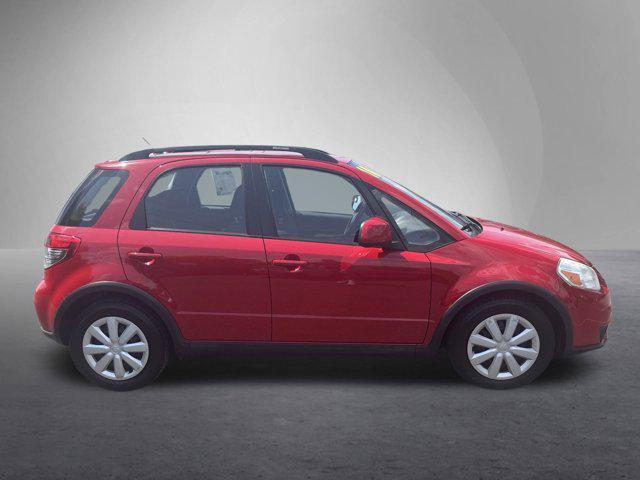 Photo of 2010 Vivid Red Suzuki SX4