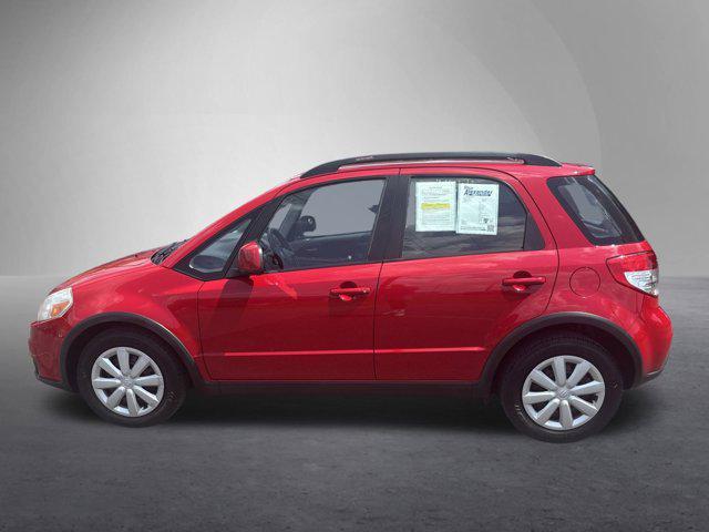 Photo of 2010 Vivid Red Suzuki SX4