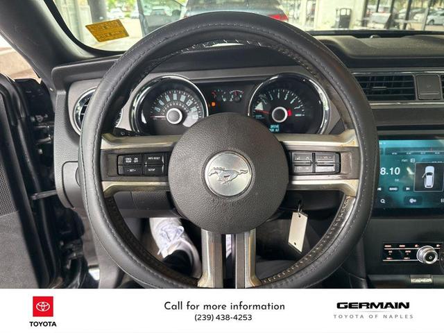 Photo of 2014 Black Ford Mustang