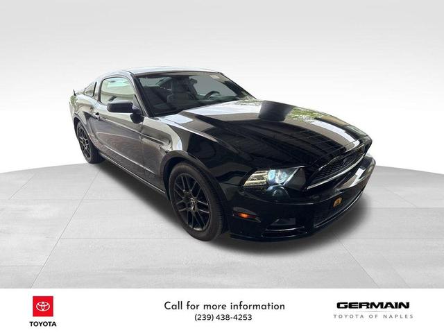 Photo of 2014 Black Ford Mustang