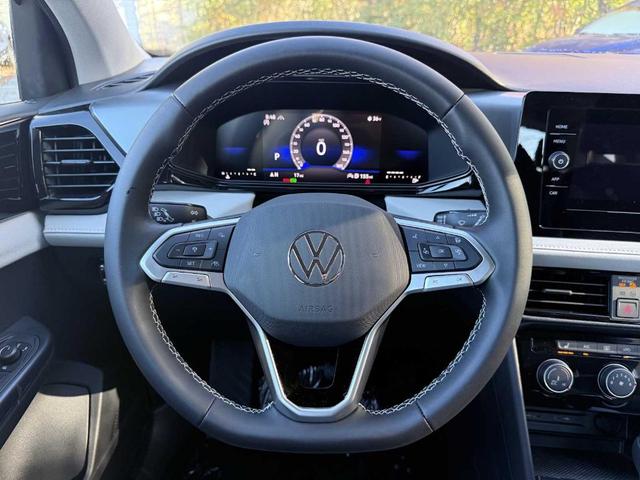 Photo of 2025 Deep Black Pearl Effect Volkswagen Taos