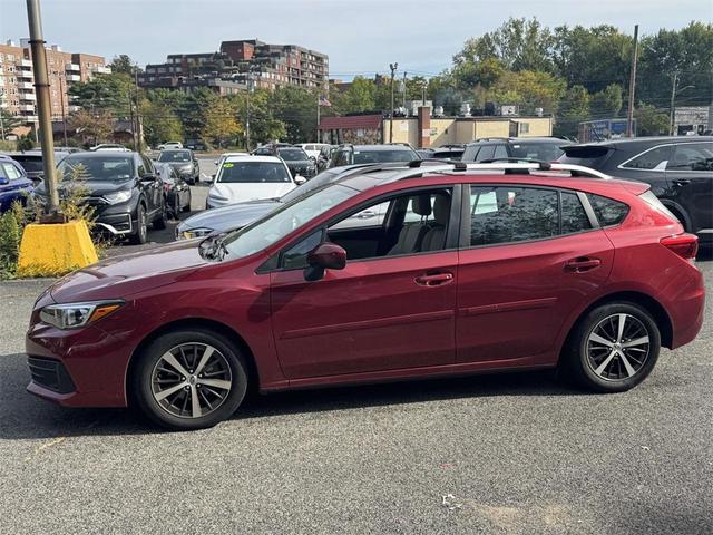 Photo of 2023 Crimson Red Pearl Subaru Impreza