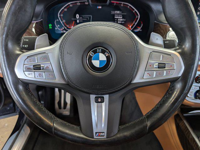 Photo of 2022 Carbon Black Metallic BMW 740
