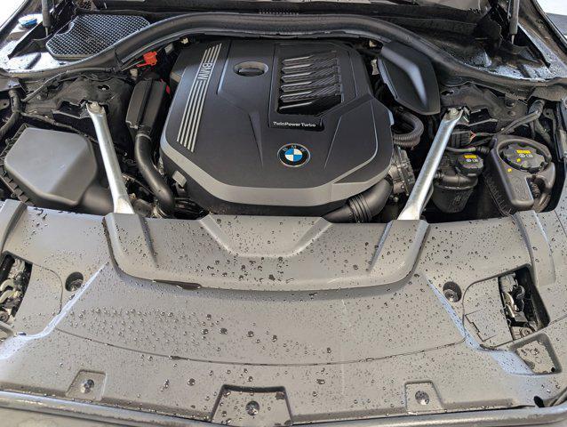 Photo of 2022 Carbon Black Metallic BMW 740