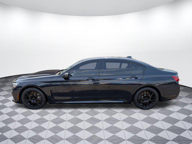 Photo of 2022 Carbon Black Metallic BMW 740