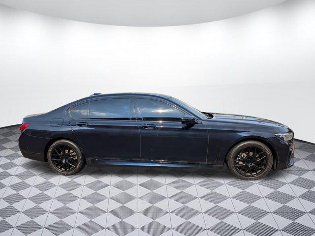 Photo of 2022 Carbon Black Metallic BMW 740