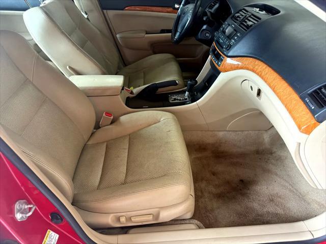 Photo of 2005 Milano Red Acura TSX