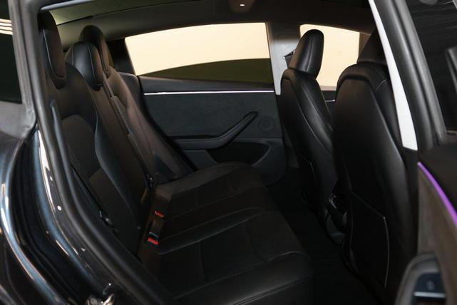 Photo of 2024 Stealth Grey Tesla Model 3