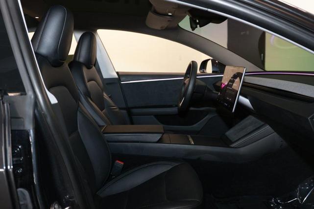 Photo of 2024 Stealth Grey Tesla Model 3