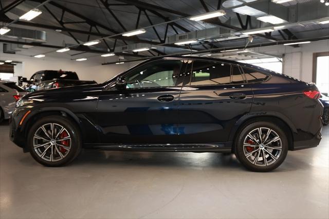 Photo of 2024 Carbon Black Metallic BMW X6