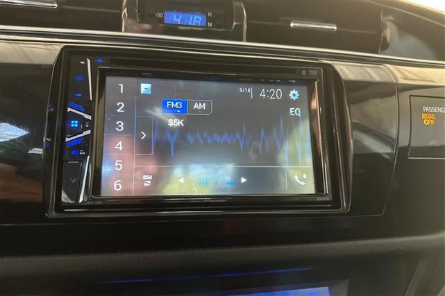 Photo of 2014 Blue Crush Metallic Toyota Corolla