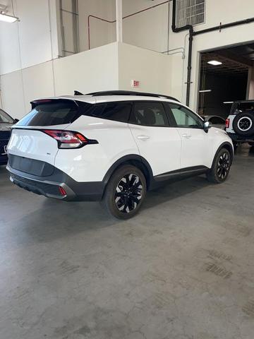 Photo of 2023 Glacial White Pearl Kia Sportage