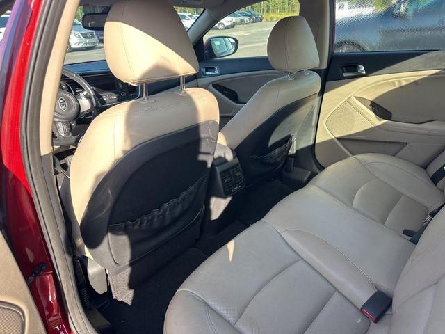 Photo of 2014 Remington Red Metallic Kia Optima