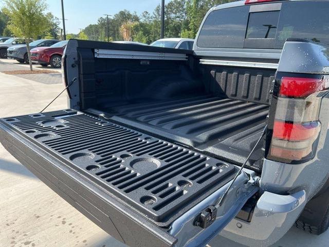 Photo of 2025 Boulder Gray Metallic Nissan Frontier