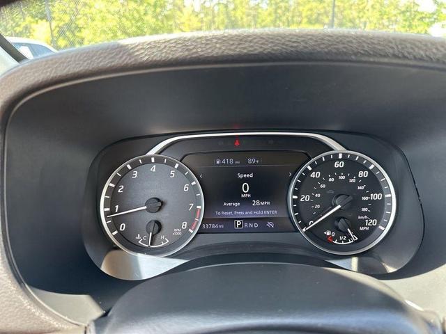 Photo of 2024 Glacier White Nissan Frontier