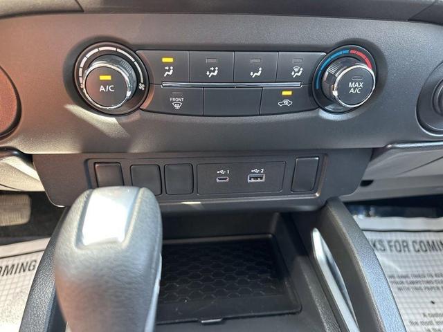 Photo of 2024 Glacier White Nissan Frontier