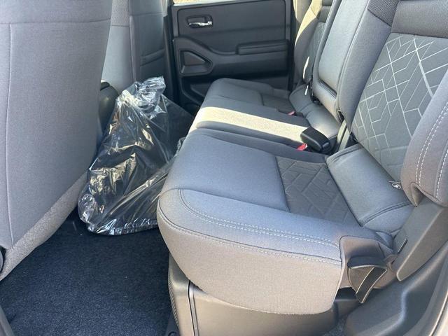 Photo of 2025 Glacier White Nissan Frontier