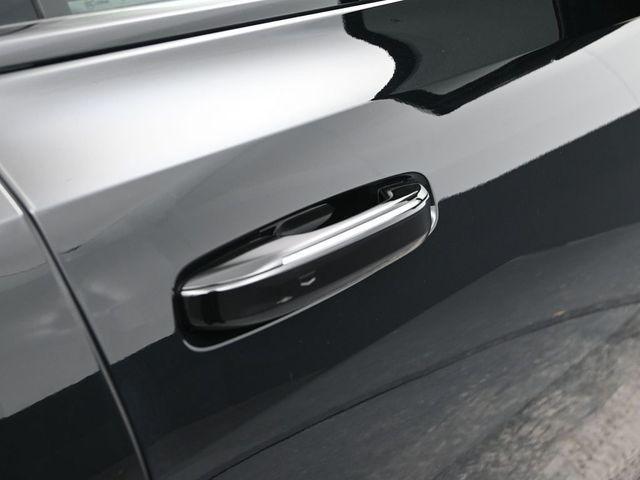 Photo of 2025 Black Raven Cadillac Escalade IQ