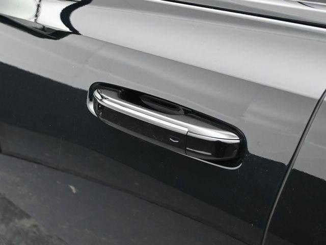 Photo of 2025 Black Raven Cadillac Escalade IQ