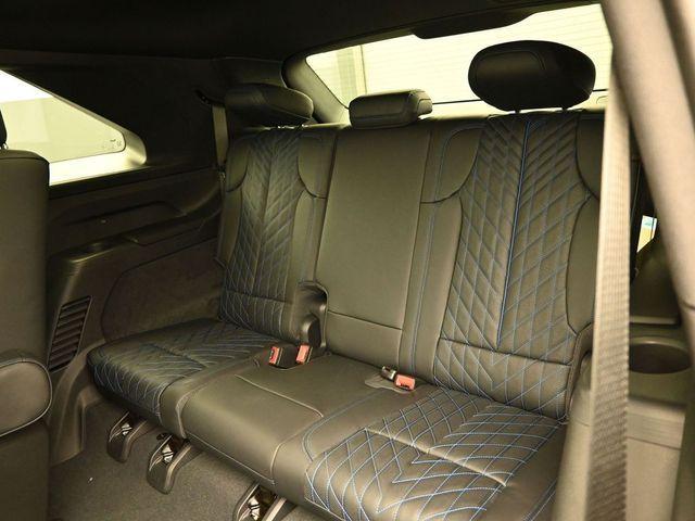 Photo of 2025 Black Raven Cadillac Escalade IQ