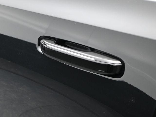 Photo of 2025 Black Raven Cadillac Escalade IQ