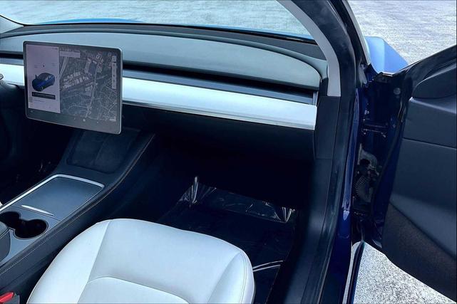 Photo of 2021 Deep Blue Metallic Tesla Model 3