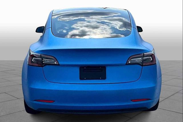 Photo of 2021 Deep Blue Metallic Tesla Model 3