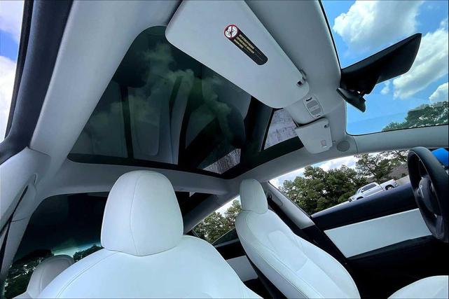 Photo of 2021 Deep Blue Metallic Tesla Model 3