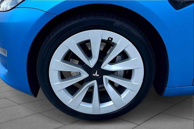 Photo of 2021 Deep Blue Metallic Tesla Model 3