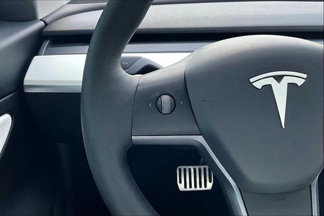 Photo of 2021 Deep Blue Metallic Tesla Model 3
