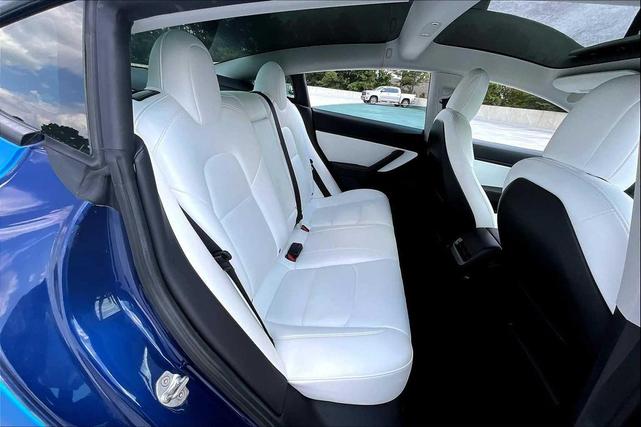 Photo of 2021 Deep Blue Metallic Tesla Model 3