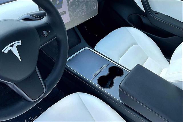Photo of 2021 Deep Blue Metallic Tesla Model 3
